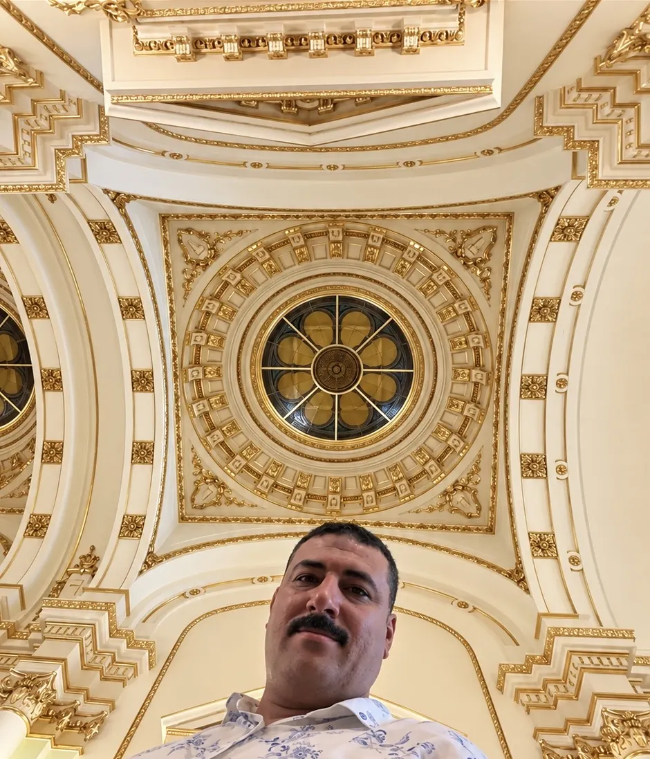 Coffered ceiling with gilded ornament around an oculus