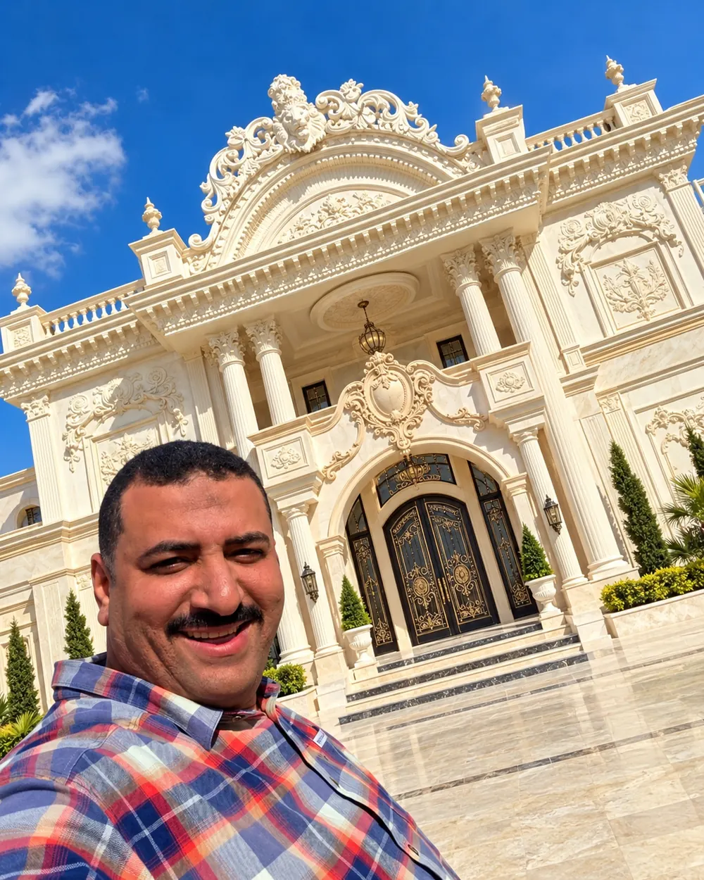 On site in front of a finished ornamental façade